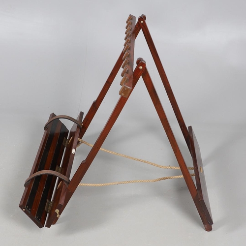 472 - A PORTABLE TEAK GUN RACK BY JOHN ORMISTON. labelled 