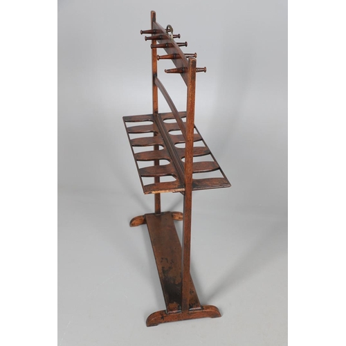 473 - A 19TH CENTURY MAHOGANY BOOT AND WHIP RACK. for five pairs of boots, with brass carrying handle, hei... 