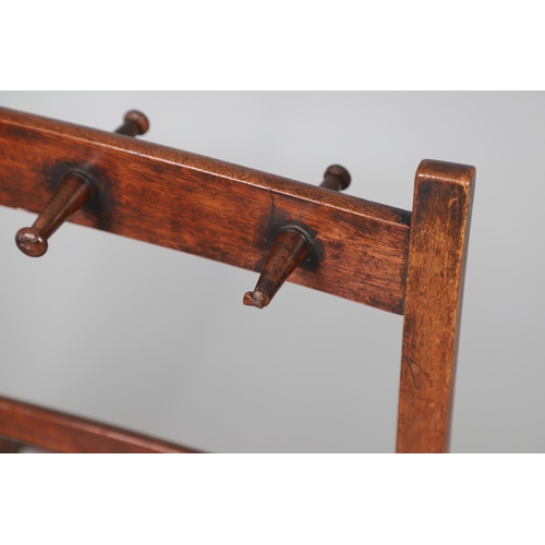 473 - A 19TH CENTURY MAHOGANY BOOT AND WHIP RACK. for five pairs of boots, with brass carrying handle, hei... 