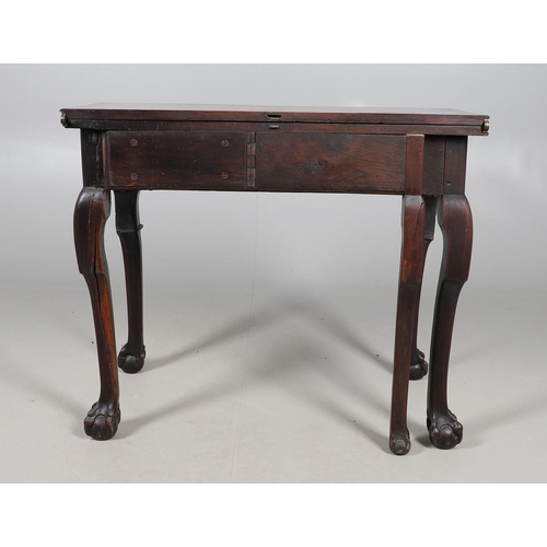 477 - AN 18TH CENTURY MAHOGANY SIDE TABLE, PROBABLY IRISH. with unusual fold-over half flap, the rectangul... 