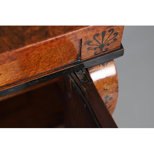 478 - A REGENCY EBONY INLAID AMBOYNA CHIFFONIER. with scrolled mounts and Neo-Classical foliate inlay, the... 