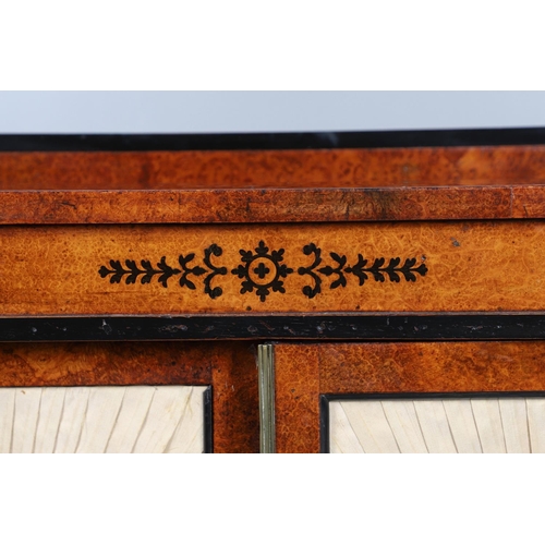 478 - A REGENCY EBONY INLAID AMBOYNA CHIFFONIER. with scrolled mounts and Neo-Classical foliate inlay, the... 