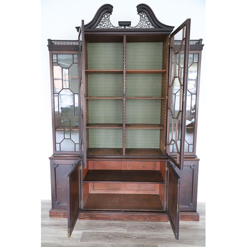 481 - A GEORGE III MAHOGANY LIBRARY BREAKFRONT BOOKCASE, CIRCA 1780. with Chippendale style fret cut scrol... 