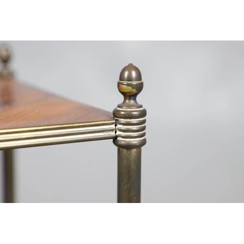 483 - A 19TH CENTURY MAHOGANY AND BRASS MOUNTED WHATNOT. of three tiers, the brass ring turned supports wi... 