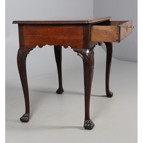 485 - AN 18TH CENTURY MAHOGANY SIDE TABLE, PROBABLY IRISH. the moulded rectangular top over a drawer, shap... 