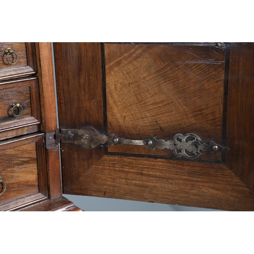 486 - AN 18TH CENTURY NORTHERN EUROPEAN OLIVEWOOD CABINET ON LATER STAND. surmounted by a drawer pediment ... 