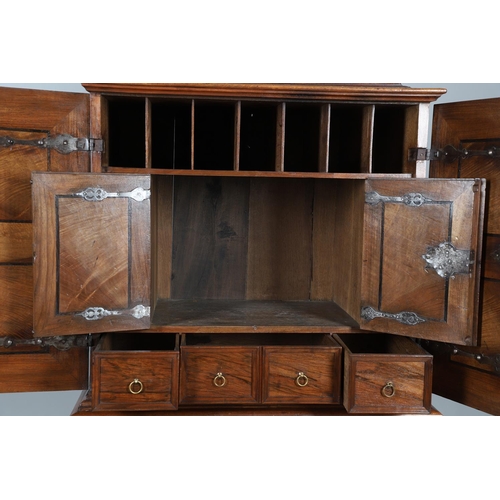 486 - AN 18TH CENTURY NORTHERN EUROPEAN OLIVEWOOD CABINET ON LATER STAND. surmounted by a drawer pediment ... 