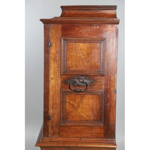 486 - AN 18TH CENTURY NORTHERN EUROPEAN OLIVEWOOD CABINET ON LATER STAND. surmounted by a drawer pediment ... 