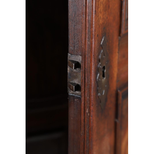 486 - AN 18TH CENTURY NORTHERN EUROPEAN OLIVEWOOD CABINET ON LATER STAND. surmounted by a drawer pediment ... 