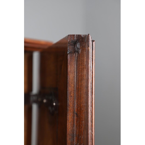 486 - AN 18TH CENTURY NORTHERN EUROPEAN OLIVEWOOD CABINET ON LATER STAND. surmounted by a drawer pediment ... 