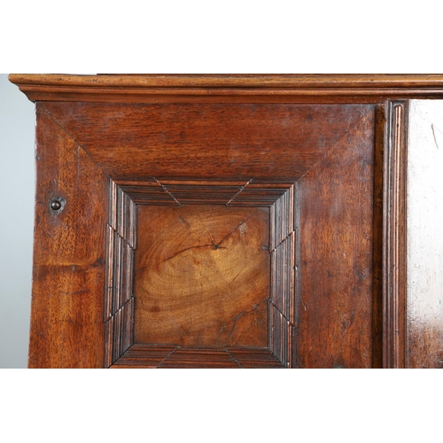 486 - AN 18TH CENTURY NORTHERN EUROPEAN OLIVEWOOD CABINET ON LATER STAND. surmounted by a drawer pediment ... 