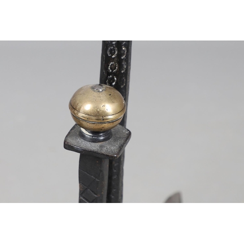 488 - A PAIR OF 18TH CENTURY STYLE WROUGHT IRON FIRE DOGS. with double brass ball finials and hammered geo... 