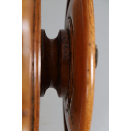 491 - AN EARLY 20TH CENTURY BURR WOOD LAZY SUSAN. with two revolving tiers to shaped oak borders and turne... 