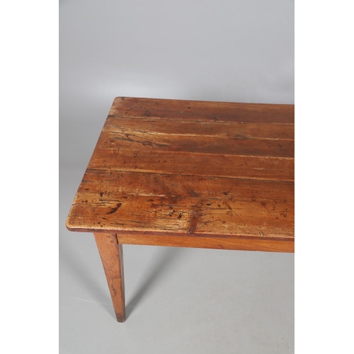 497 - A FRENCH FRUITWOOD FARMHOUSE TABLE. late 19th/early 20th century, the multiple plank top over a side... 