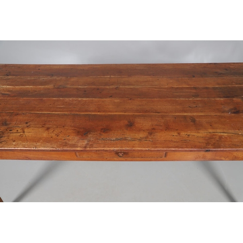 497 - A FRENCH FRUITWOOD FARMHOUSE TABLE. late 19th/early 20th century, the multiple plank top over a side... 