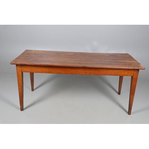 497 - A FRENCH FRUITWOOD FARMHOUSE TABLE. late 19th/early 20th century, the multiple plank top over a side... 