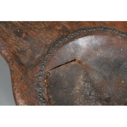 498 - A 19TH CENTURY ELM (?) COBBLER'S BENCH. with divisional section to one end and copper studded leathe... 