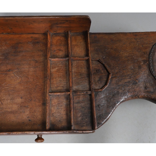 498 - A 19TH CENTURY ELM (?) COBBLER'S BENCH. with divisional section to one end and copper studded leathe... 