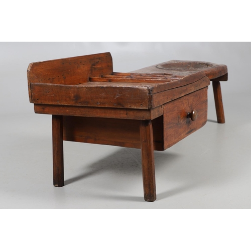 498 - A 19TH CENTURY ELM (?) COBBLER'S BENCH. with divisional section to one end and copper studded leathe... 