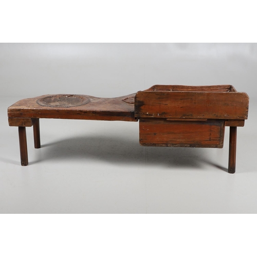 498 - A 19TH CENTURY ELM (?) COBBLER'S BENCH. with divisional section to one end and copper studded leathe... 