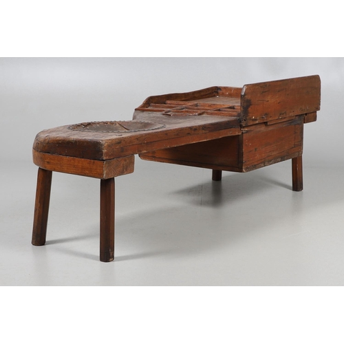 498 - A 19TH CENTURY ELM (?) COBBLER'S BENCH. with divisional section to one end and copper studded leathe... 