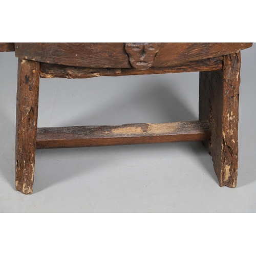 499 - A PRIMITIVE OAK CHEESE PRESS, CONVERTED TO A TABLE. 18th century, the top with original whey drain, ... 