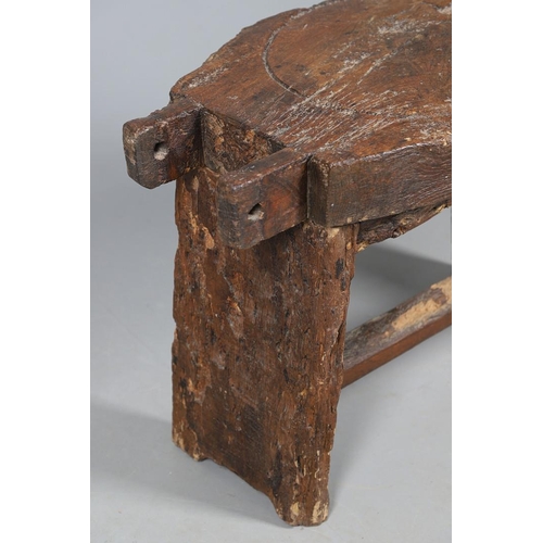 499 - A PRIMITIVE OAK CHEESE PRESS, CONVERTED TO A TABLE. 18th century, the top with original whey drain, ... 