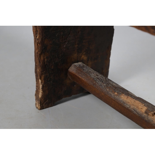 499 - A PRIMITIVE OAK CHEESE PRESS, CONVERTED TO A TABLE. 18th century, the top with original whey drain, ... 