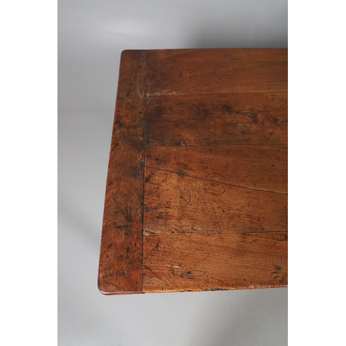 500 - A 19TH CENTURY FRUITWOOD FARMHOUSE TABLE. the multiple plank upon block supports united by a stretch... 