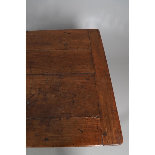 500 - A 19TH CENTURY FRUITWOOD FARMHOUSE TABLE. the multiple plank upon block supports united by a stretch... 