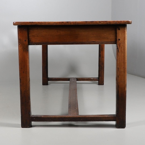 500 - A 19TH CENTURY FRUITWOOD FARMHOUSE TABLE. the multiple plank upon block supports united by a stretch... 