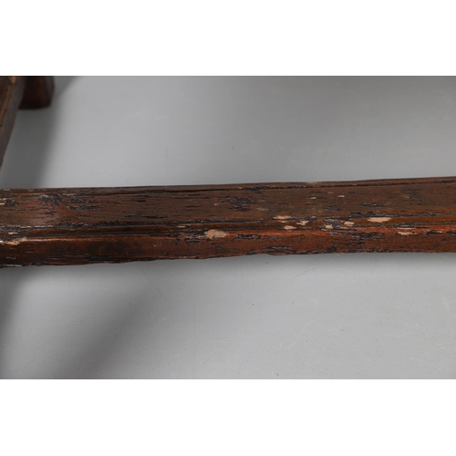 500 - A 19TH CENTURY FRUITWOOD FARMHOUSE TABLE. the multiple plank upon block supports united by a stretch... 