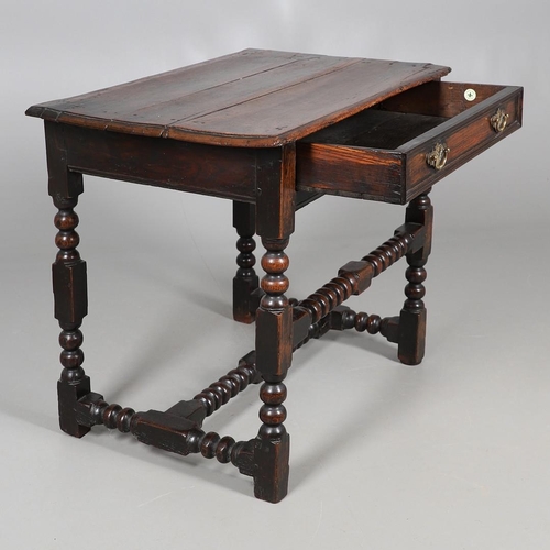 501 - A CHARLES II OAK SIDE TABLE. the moulded edge top over single drawer with applied moulding, on turne... 