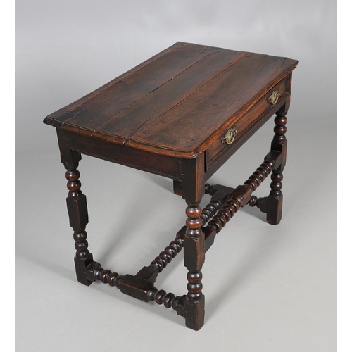 501 - A CHARLES II OAK SIDE TABLE. the moulded edge top over single drawer with applied moulding, on turne... 