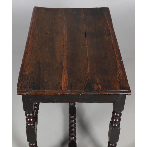 501 - A CHARLES II OAK SIDE TABLE. the moulded edge top over single drawer with applied moulding, on turne... 