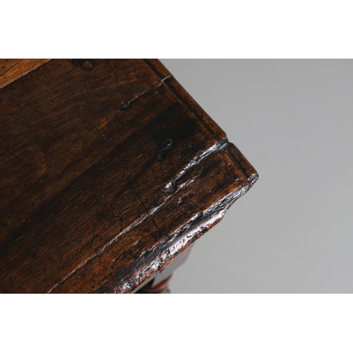 501 - A CHARLES II OAK SIDE TABLE. the moulded edge top over single drawer with applied moulding, on turne... 