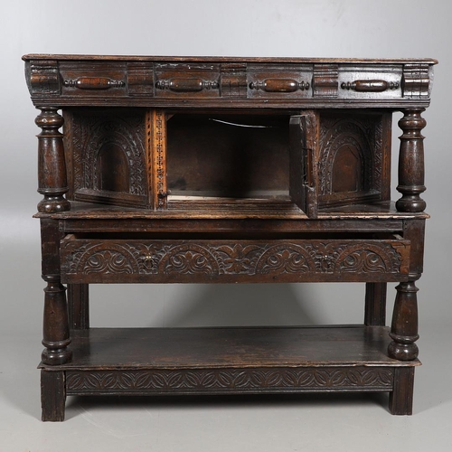 502 - A 17TH CENTURY OAK AND MARQUETRY COURT CUPBOARD. the upper trapezoidal section centred by cupboard d... 