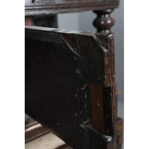 502 - A 17TH CENTURY OAK AND MARQUETRY COURT CUPBOARD. the upper trapezoidal section centred by cupboard d... 