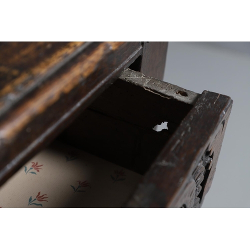 502 - A 17TH CENTURY OAK AND MARQUETRY COURT CUPBOARD. the upper trapezoidal section centred by cupboard d... 