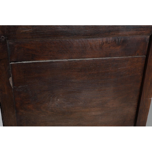 503 - AN EARLY 19TH CENTURY WELSH OAK CUPBOARD. with three small drawers above ogee arch panelled cupboard... 