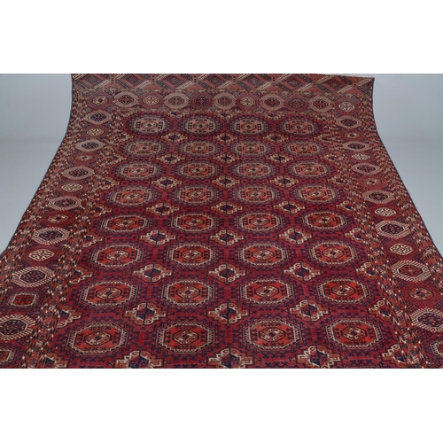 506 - A TEKKE TURKMEN CARPET, EMIRATE OF BUKHARA, CIRCA 1900. the raspberry field with four columns of Sal... 