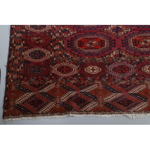 506 - A TEKKE TURKMEN CARPET, EMIRATE OF BUKHARA, CIRCA 1900. the raspberry field with four columns of Sal... 