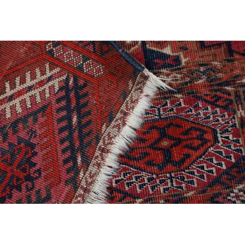 506 - A TEKKE TURKMEN CARPET, EMIRATE OF BUKHARA, CIRCA 1900. the raspberry field with four columns of Sal... 