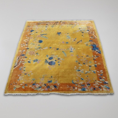 510 - A WALTER NICHOLS 'ART DECO' CHINESE CARPET, CIRCA 1925. the mustard field sparsely decorated with na... 