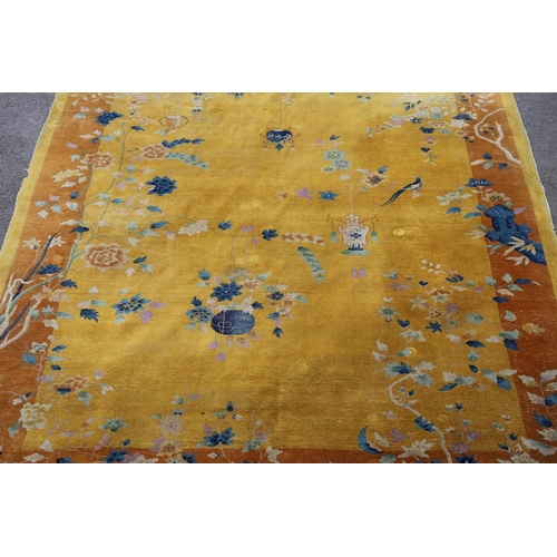 510 - A WALTER NICHOLS 'ART DECO' CHINESE CARPET, CIRCA 1925. the mustard field sparsely decorated with na... 