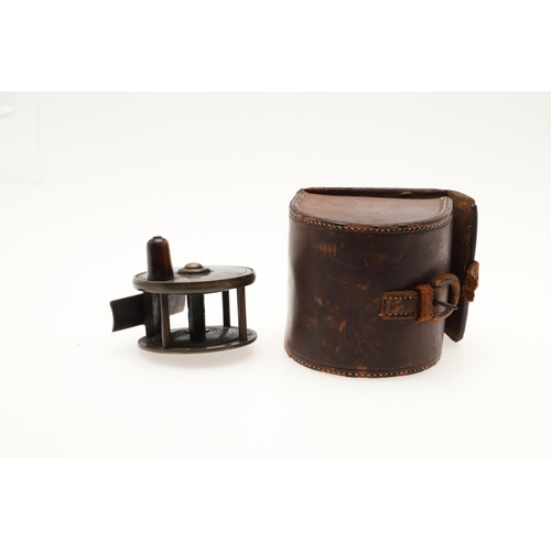 520 - ANTIQUE FISHING REELS & BLOCK LEATHER CASES. Including a small 2 1/2inch brass reel in a Farlow & Co... 