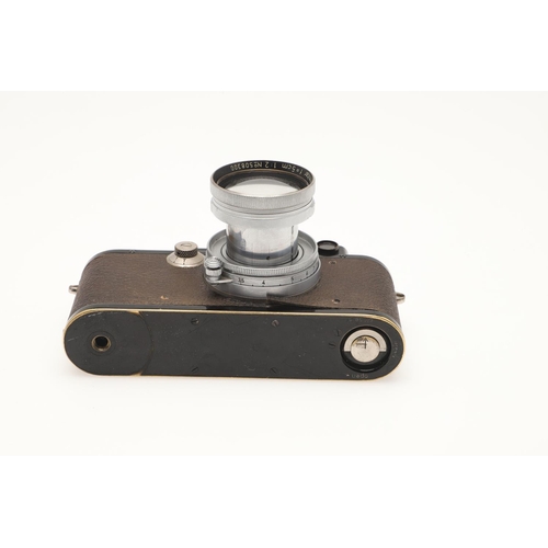 540 - LEICA III RANGEFINGER CAMERA. A Leica III rangefinder camera, Serial No 121772 (1933), with a Ernst ... 