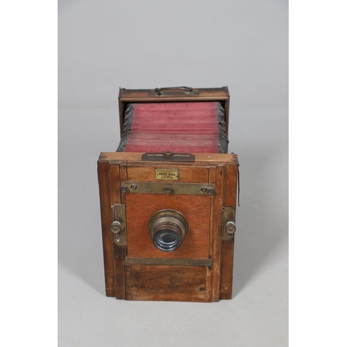 541 - LARGE PLATE CAMERA - PHOTO HALL, PARIS. A large mahogany plate camera with red coloured bellows, wit... 