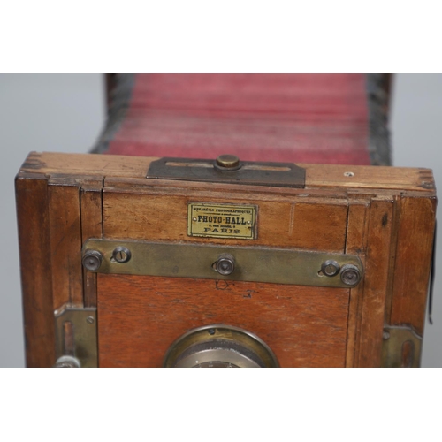 541 - LARGE PLATE CAMERA - PHOTO HALL, PARIS. A large mahogany plate camera with red coloured bellows, wit... 