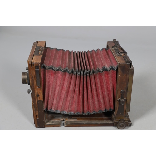 541 - LARGE PLATE CAMERA - PHOTO HALL, PARIS. A large mahogany plate camera with red coloured bellows, wit... 